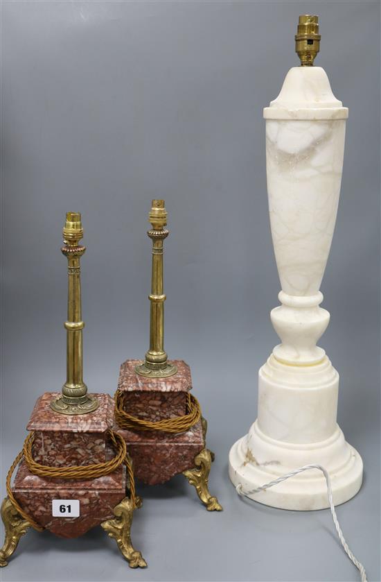 An alabaster lamp and two others tallest 62cm